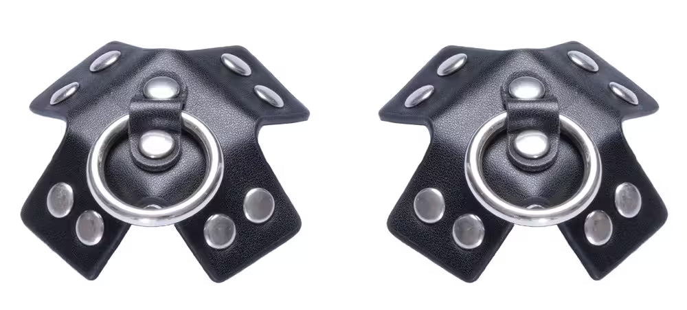 Korsformade bröstvårtsstickers med nitar