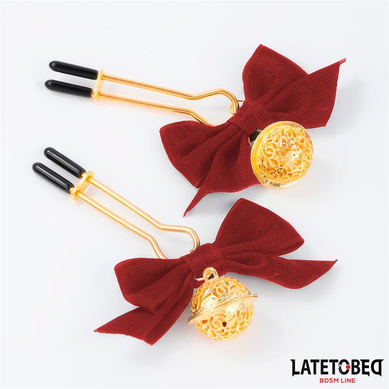 Bröstklämmor med Rosett och Bjällror