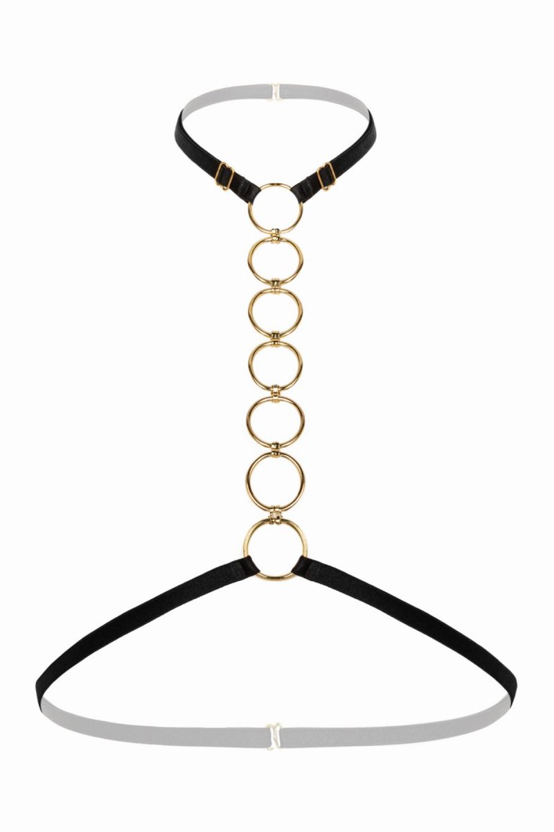 Kaula- ja vyötärövyö kultaisilla renkailla