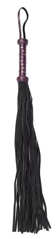 Elegant flogger med gulddetaljer